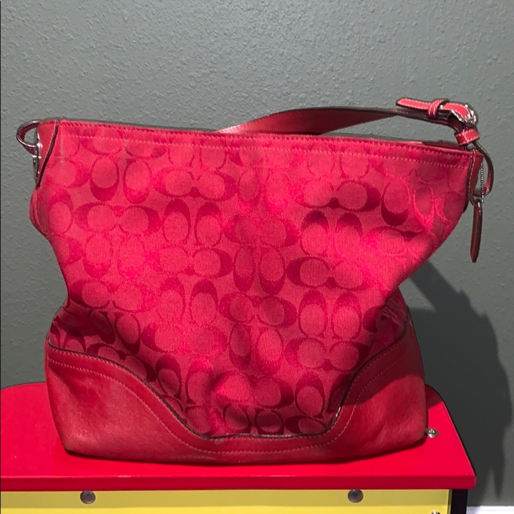 Bright red Coach purse